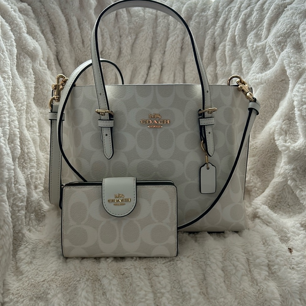 Slightly used small Coach bag and small wallet.